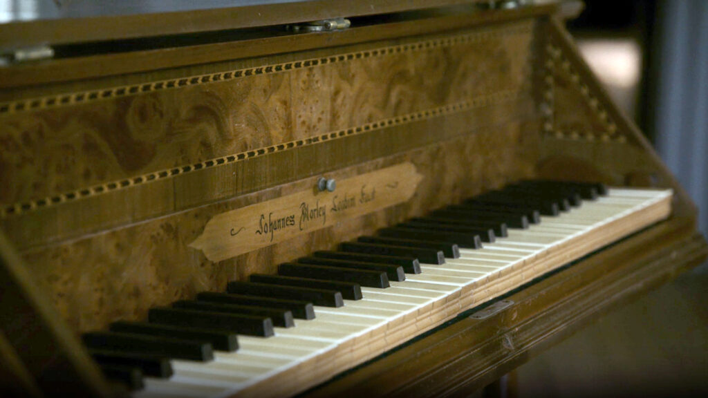 Screenshot of a piano from the American Revolution film